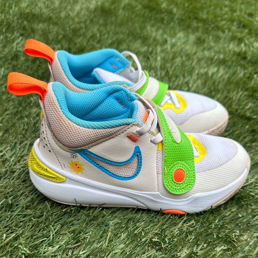 Nike Kids White Sneakers with Blue, Green & Orange Accents